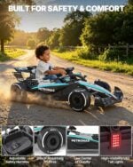 First Ride On Mercedes-AMG Petronas F1 style kids electric ride-on car showing safety harness, shock-absorbing tires, and LED tail lights