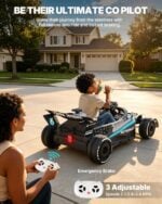 Parent using remote control for First Ride On Mercedes-AMG Petronas F1 style kids ride-on car with emergency brake feature